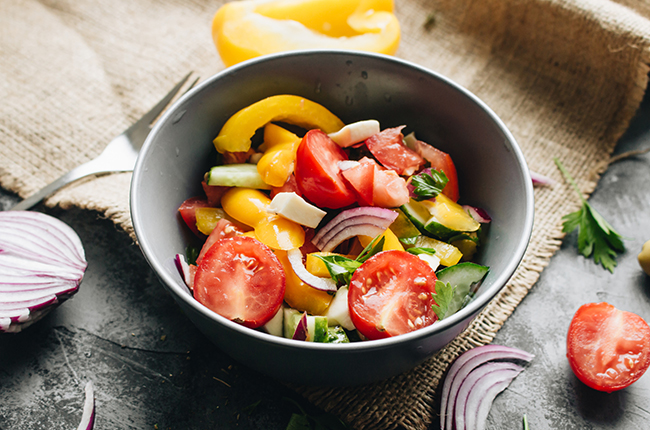 Delicious Greek salad or Horiatiki salad with ingredients
